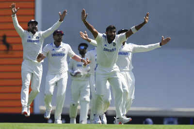 Indias-Jasprit-Bumrah-appeals-successfully-for-the-wicket-of-Australias-Marnus-.jpg