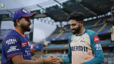 Rohit-Sharma-and-Mohammed-Siraj.jpg