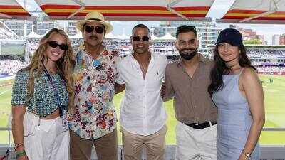 virat-kohli-anushka-sharma-cheer-for-team-india-at-womens-t20-world-cup-clash-pose-with-ravi-shastri.jpeg