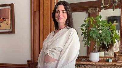 anne-hathaway-says-she-was-shocked-to-learn-she-was-pregnant-with-baby-no-3-were-calling-this-one-ou.jpeg